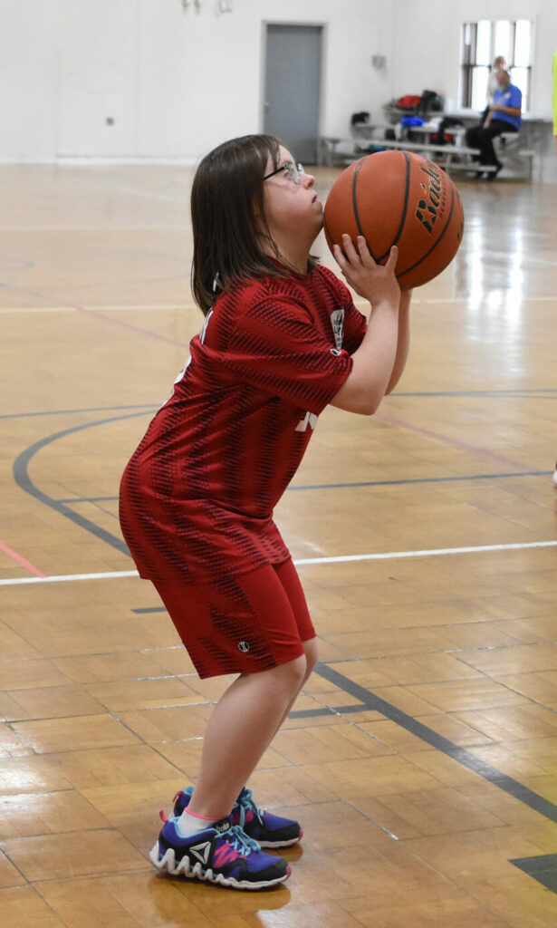 Josie Mashlan, nominee for female athlete of the year, playing basketball.