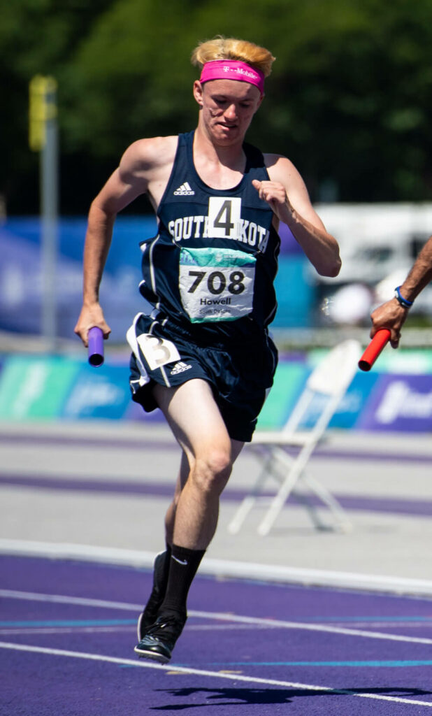 Samuel Howell, nominee for male athlete of the year, running track.